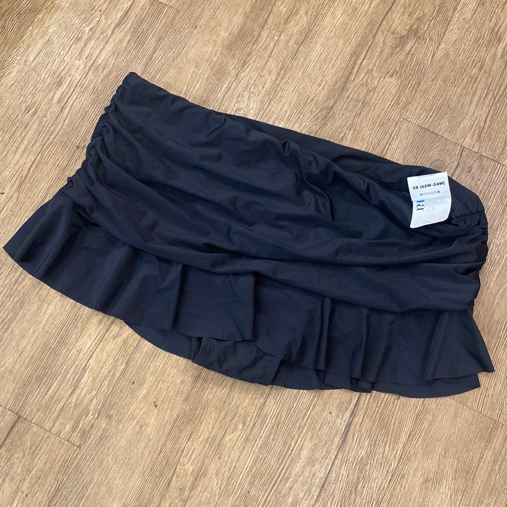 Brand new swim skirt with built in brief